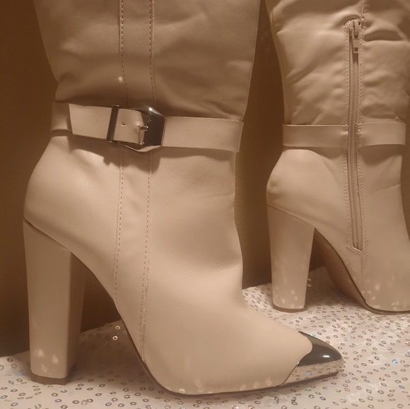 White Thigh High Boots with silver tips around toe and buckle around ankles. - Picture 3 of 5
